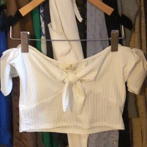 Laura’s boutique white bow crop top